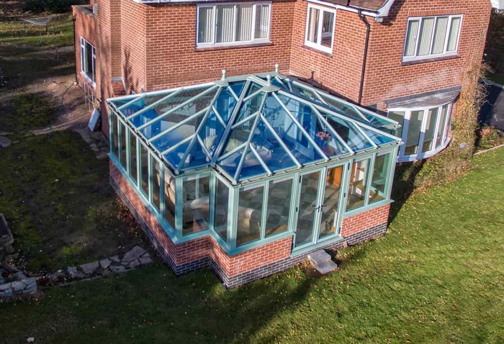 T Shaped uPVC conservatory with a glass roof